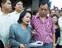 Arroyo sworn in as Philippines' new president